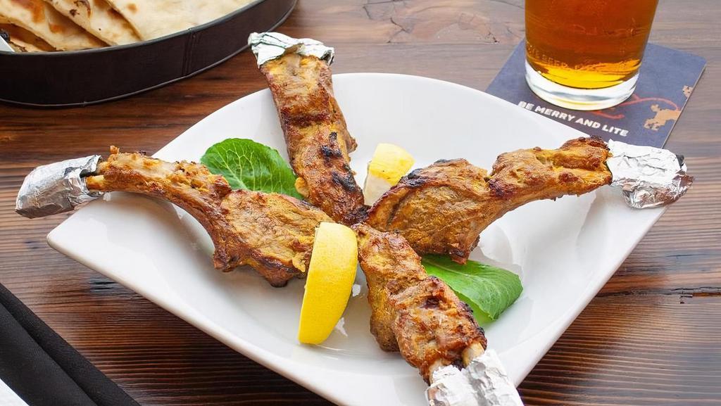Lamb Chops · Lamb chops marinated in yogurt spiced with ginger, garlic & chef's spl. Spices