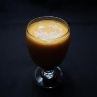 All Natural Mango Lassi · Drink Made with Homemade sweet yogurt and Mangoes