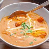 Chicken Tikka Masala · Boneless chicken cooked with onions & bell peppers in a mild spiced sauce