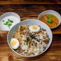 Egg Biryani · Basmati Rice cooked with farm fresh eggs and layered with special Indian herbs and spices.