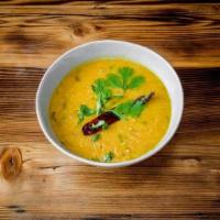 Tadka Dal · Yellow lentils cooked to perfection with mild spices
