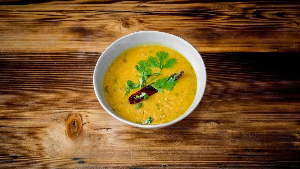 Tadka Dal · Yellow lentils cooked to perfection with mild spices
