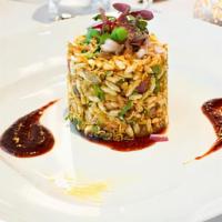 Bhel Poori · Assorted crisps and noodles, sweet and sour chutneys