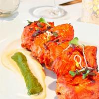 Punjabi Tikhe Kabab · Boneless chicken marinated in yogurt, roasted whole spices, jalapeños, ginger, garlic
