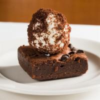 Warm Double Fudge Brownie · Vanilla bean ice cream