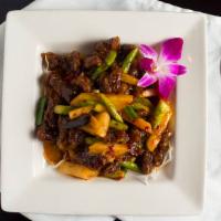 Szechuan Spicy Beef · Hot. Beef, baby corn, red pepper sautéed with caramelized soy reduction.