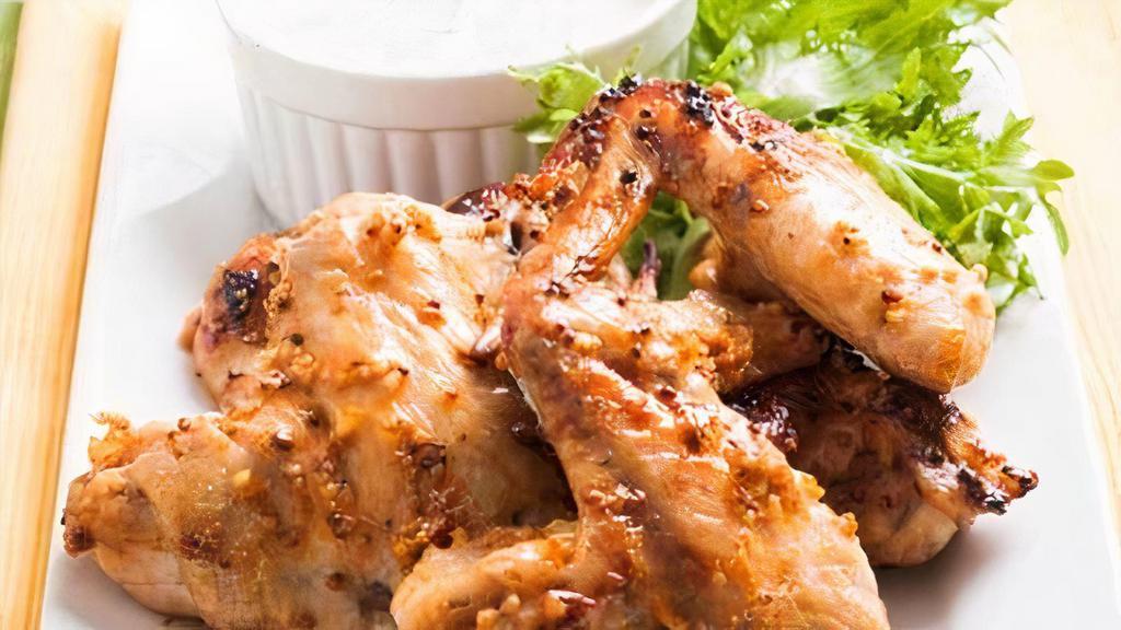 Honey Mustard Wings · Fresh batch of crispy chicken wings tossed in honey mustard and served with a side of ranch.