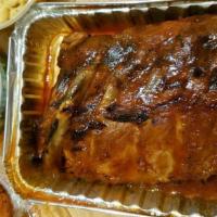 Bbq Baby Back Ribs Banquet · Five racks of ribs and a tray of side and 12 cornbread.