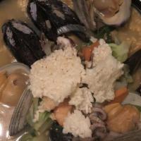 Mild Seafood Stew With Crispy Rice
 · 해물 누룽지탕