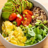 The Scrambled · A warm bowl with wild rice, scrambled eggs, arugula, cherry tomatoes, avocado, and scallions...