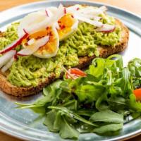 Avocado Toast · Smashed avocado & cilantro lime dressing spread on toasted all-natural sourdough bread toppe...
