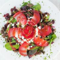 Goat Cheese Salad · Candied pecans, dried cranberries and goat cheese in a raspberry vinaigrette with a cabernet...
