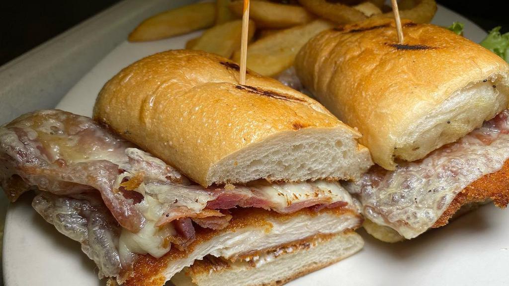 Mac Park Chicken Sandwich · Grilled chicken cutlet, bacon, swiss cheese, horseradish sauce on garlic bread.
