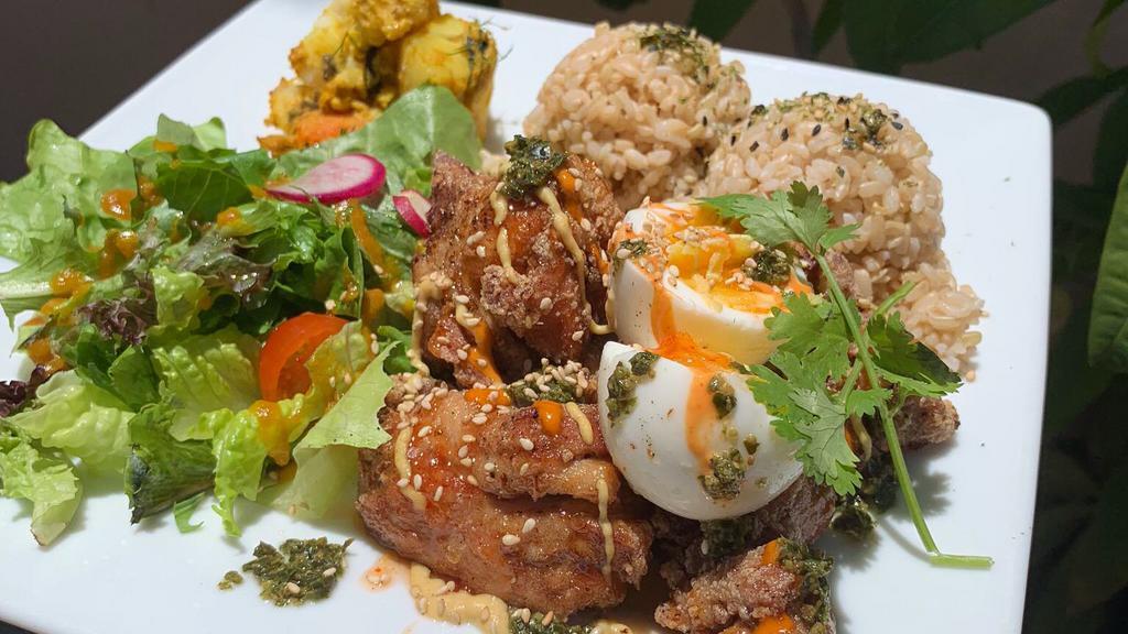 Mochiko Local Chicken · Mochiko Chicken, local egg, homemade sauce, served with rice, organic green, and one side dish.