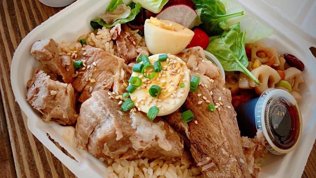 Pork Kakuni · Japanese braised pork served with rice, organic greens, and one side dish.