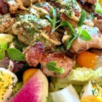 Dijon Chicken Salad · Grilled chicken, fresh local egg, romaine lettuce, organic greens, tomato, baguette, house d...