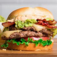 Guac Burger · Two beef patties cooked-to-order, topped with two slices of Pepper Jack cheese, bacon, lettu...