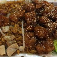 Sesame Chicken · Served with pork fried rice and a choice of soup or soda.