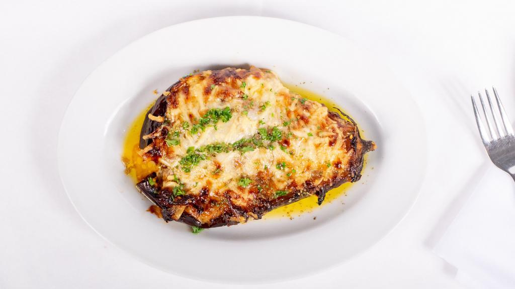 Imam · Roasted eggplant, caramelized onions in organic tomato sauce, herbs and olive oil.