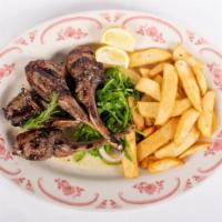 Paidakia (Lamb Chops) · New Zealand charcoal grilled baby lamb chops, served with Greek style fresh cut fries.