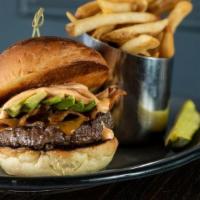 -Astoria Burger · K&t meats signature blend burger, bacon, cheddar, avocado, and chipotle aioli.