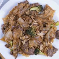 Pad See Ew · Sautéed flat rice noodles with egg and broccoli in a sweet yellow bean sauce.