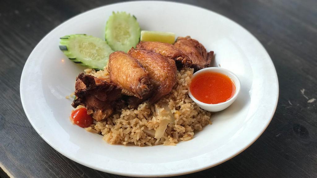 Bangkok Fried Rice · Thai style chicken wing with basil fried rice.