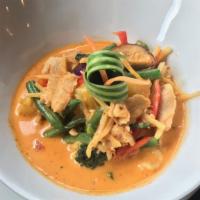 Red Curry · Smooth creamy coconut milk with hot red chili paste, eggplants, bamboo shoots, string beans,...
