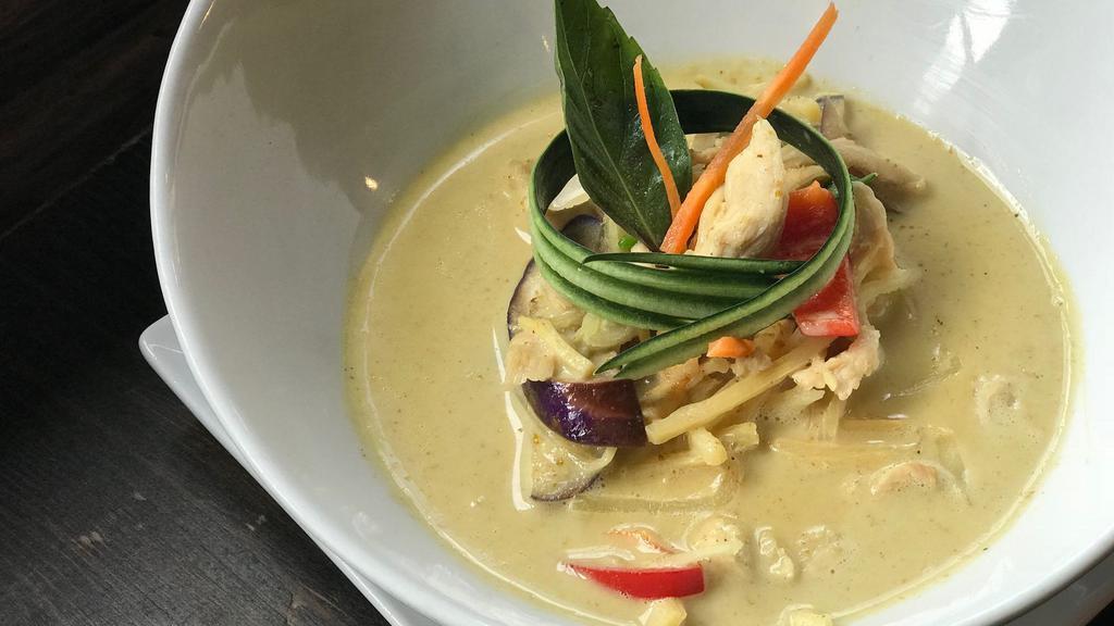Green Curry · Hot and light sweet curry in the mixed of coconut milk, eggplants, bamboo shoots, string beans, basil and bell peppers.