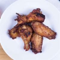 Thai Chicken Wings · Fried marinated wings served with thai sweet and spicy sauce.