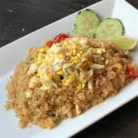 Crab Meat Fried Rice · Delicious fried rice with jumbo lump crabmeat, onions, scallion, tomatoes, carrots and egg.