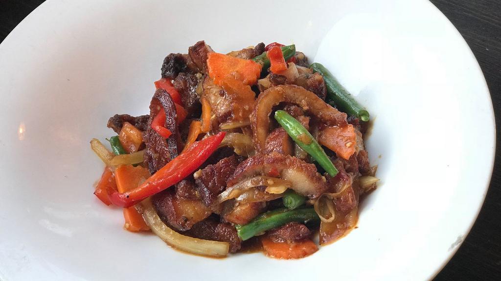 Crispy Pork Belly Basil · Sauteed crispy pork belly fresh basil leaves, string beans, carrots, onions, bell peppers, chili and garlic basil sauce.