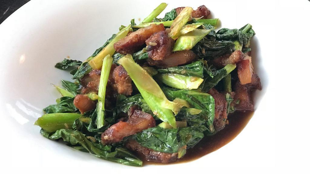 Crispy Pork Belly With Chinese Broccoli · Sauteed Chinese broccoli and crispy pork belly with chili and garlic sauce.