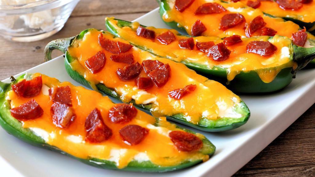 Cheddar Jalapeño Poppers · Jalapeños stuffed with cheese then crisped to perfection.