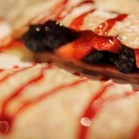 Wild Berry Crêpe · Strawberries, blueberries, and raspberry toppings. All sweet crepes are not served with syru...