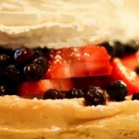 Berries And Cream Waffle · Fresh strawberries, blueberries, powdered sugar and whipped cream.