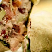 Chicken Salad Wrap · Homemade chicken salad with dried cranberries and Granny Smith apples, spring greens, tomato...