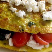 Greek Omlet · Spinach , feta cheese, tomato.