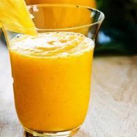 Paradise Smoothie · PINEAPPLE , ORANGE, BLENDED WITH ICE AND SOME SUGAR