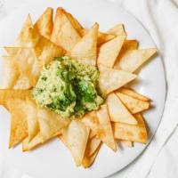 Guacamole And Chips · Guacamole, served with crispy corn tortilla chips.