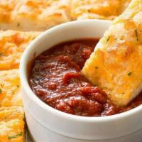 Garlic Bread With Cheese  · A cross between garlic bread and pizza, cheesy bread is a quick, easy, and delicious party s...