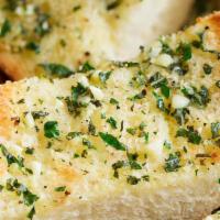 Garlic Bread  · Bread, topped with garlic, herb seasoning, baked to perfection.