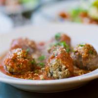 Homemade Meatballs (3) · Ground meat prepared with bread crumbs, minced onion, and Italian seasoning.
