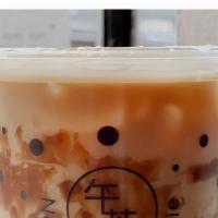 Brown Sugar Boba Earl Grey Milk Tea · Cold brew earl grey tea with lactose fee milk and brown sugar boba and ice.