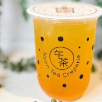 Mango Passion Fruit Tea · One of our top 5 items.  
Cold brew jasmine green tea with mango and passion fruit flavor.
C...