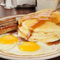 Fluffy Pancakes With Sausage · Fluffy, rich pancakes with melted butter and delicious sausage.