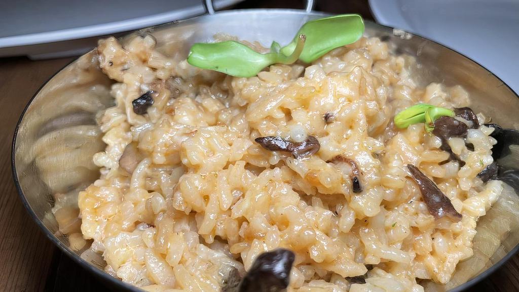 Wild Mushroom Risotto · wild mushroom with slow cooked arborio rice with shallots, white wine, chicken stock, butter, parmigiano. Gluten-free. Vegan.
