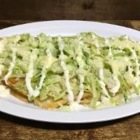 Quesadilla · Corn tortilla filled with mozzarella cheese and your meat preference topped with lettuce sou...