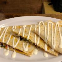 Quesadilla De Tortilla · Flour tortilla filled with mozzarella cheese, your meat preference, tomato, onions, cilantro...