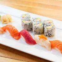Sushi Lunch · 5 pieces of assorted sushi and 1 California roll. Served with your choice of side.
